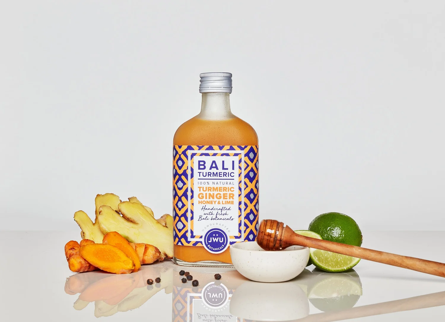 Bali turmeric jamu tonic with fresh root and leaves